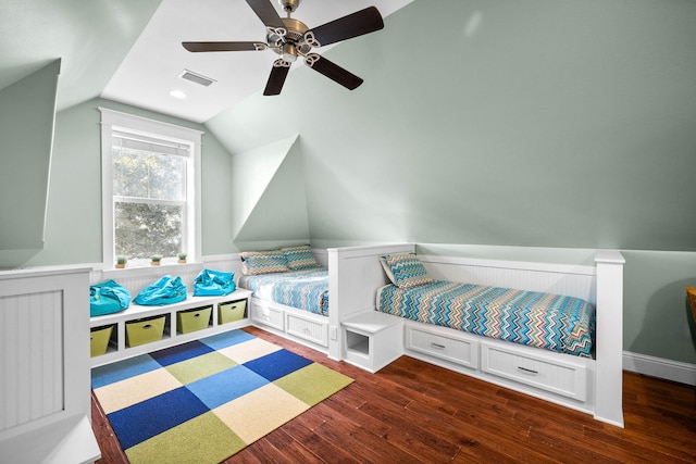 bedroom featuring vaulted ceiling, dark wood-type flooring, and ceiling fan