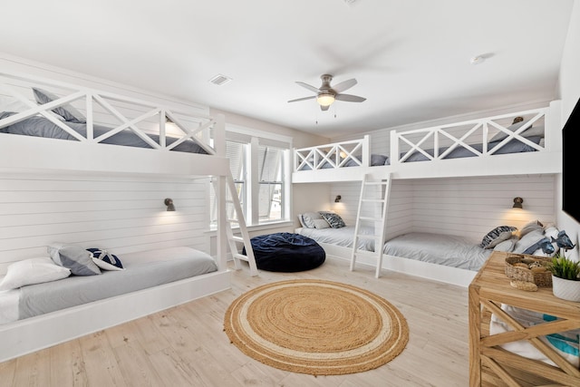 bedroom featuring ceiling fan and wood-type flooring