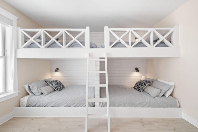 bedroom with light wood-type flooring