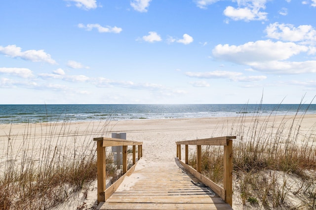 view of water feature with a beach view