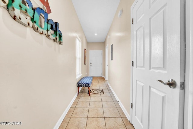 hallway featuring light tile patterned floors