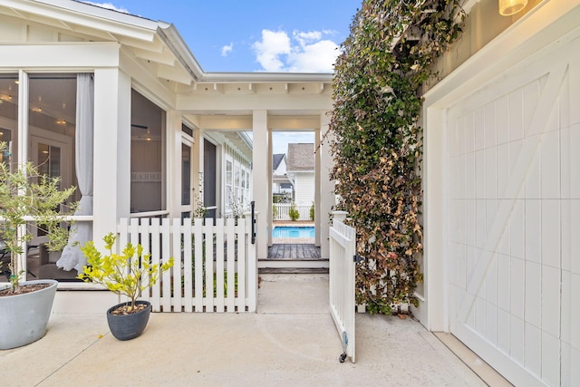 property entrance with a patio