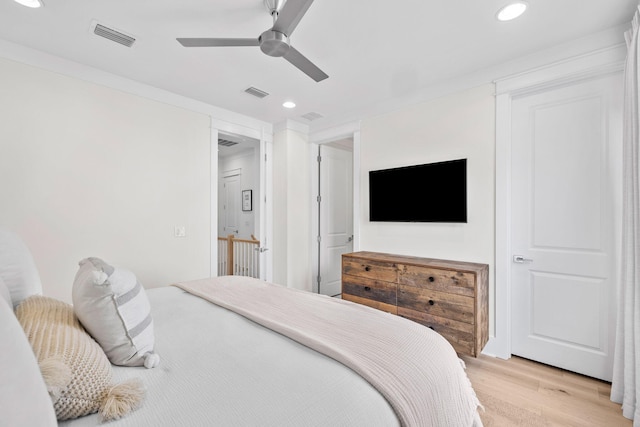 bedroom featuring ceiling fan and light wood-type flooring