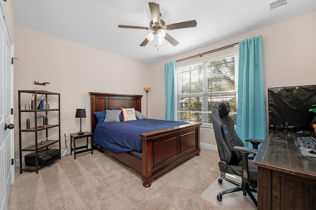 carpeted bedroom with ceiling fan