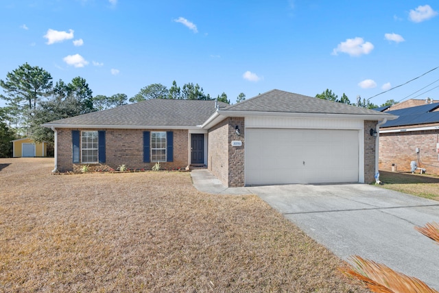 ranch-style house featuring a garage and a front lawn