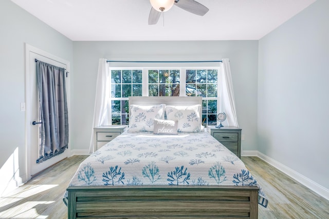 bedroom featuring ceiling fan and light wood-type flooring