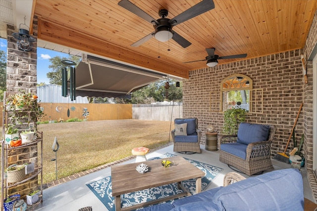 1911 Ladybird Ln, Gulf Breeze, FL 32563 - view of patio / terrace with an outdoor living space, fence, and ceiling fan