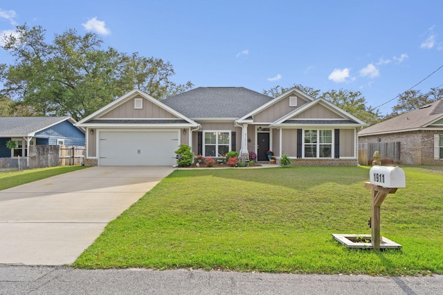 1911 Ladybird Ln, Gulf Breeze, FL 32563 - craftsman inspired home with board and batten siding, concrete driveway, fence, and an attached garage