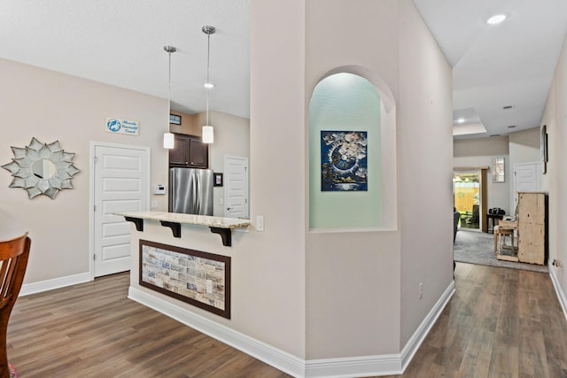 1911 Ladybird Ln, Gulf Breeze, FL 32563 - corridor featuring dark wood finished floors, baseboards, and recessed lighting