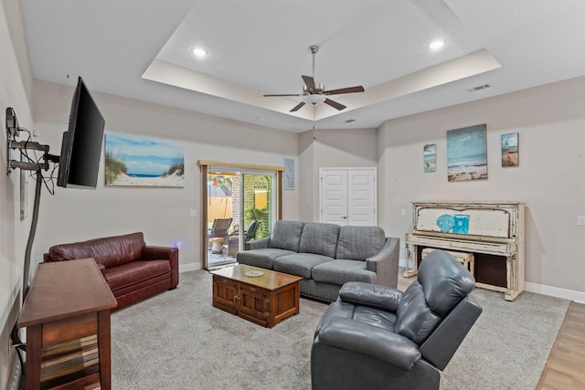 1911 Ladybird Ln, Gulf Breeze, FL 32563 - living room featuring a tray ceiling, baseboards, visible vents, ceiling fan, and recessed lighting