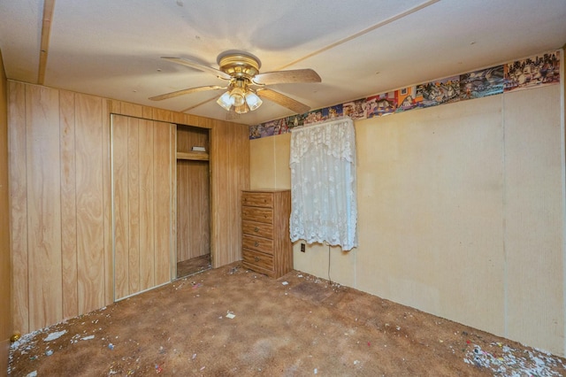 unfurnished bedroom featuring ceiling fan