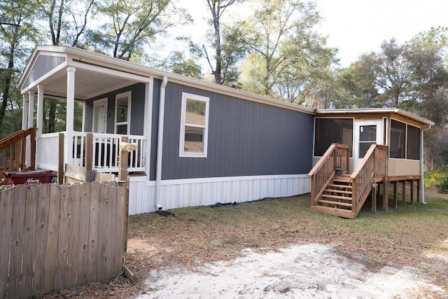 manufactured / mobile home featuring a sunroom