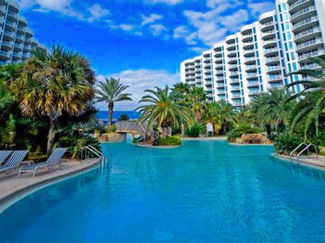 view of pool featuring a water view