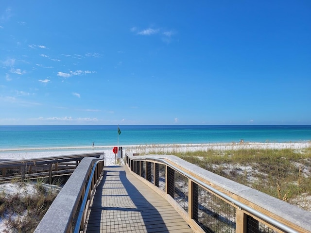 view of community featuring a water view and a view of the beach