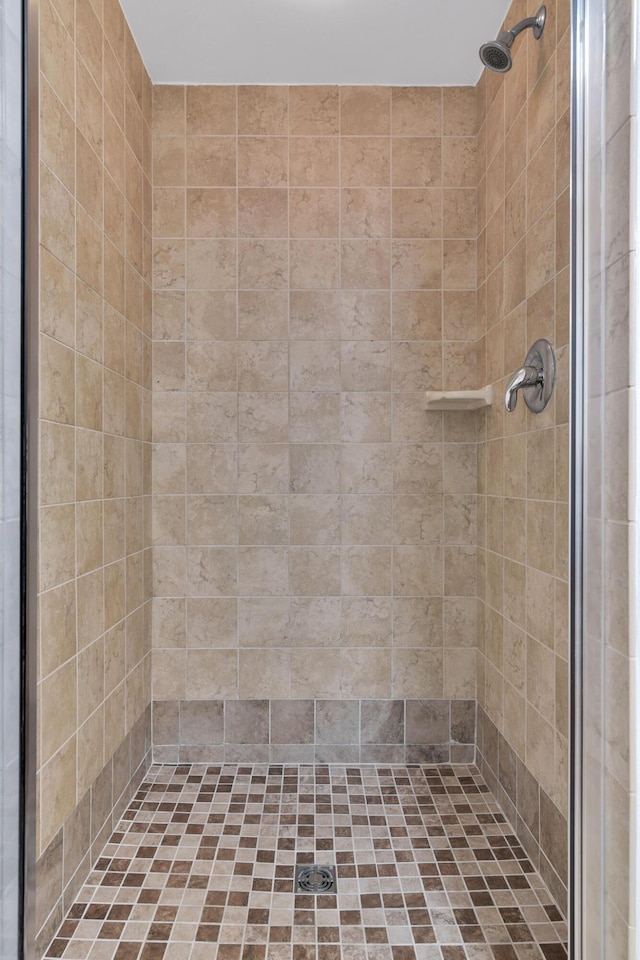 bathroom featuring a stall shower