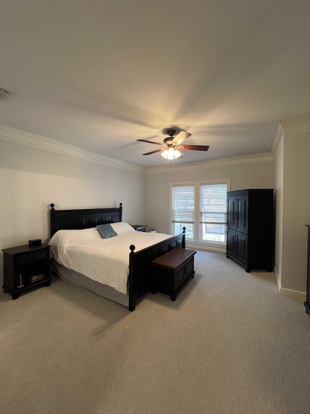 bedroom featuring ornamental molding, light carpet, and ceiling fan