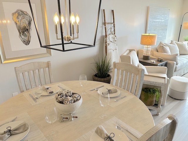 dining area featuring wood-type flooring