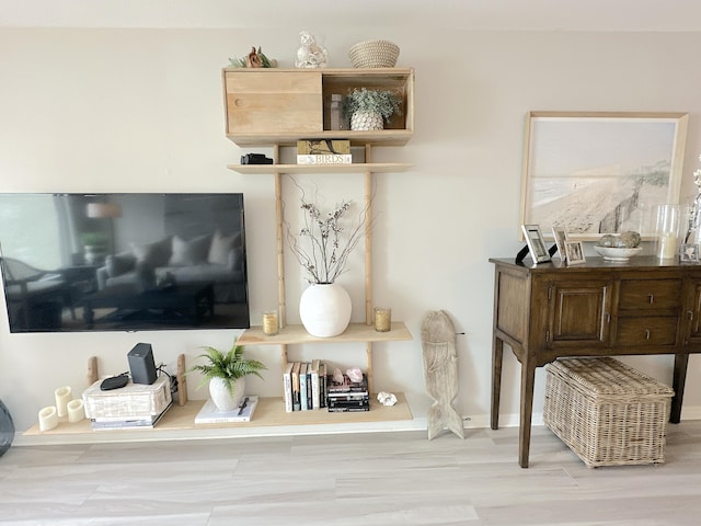 interior details featuring hardwood / wood-style flooring