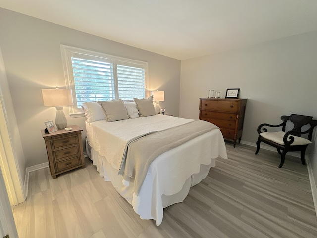 bedroom featuring light hardwood / wood-style floors