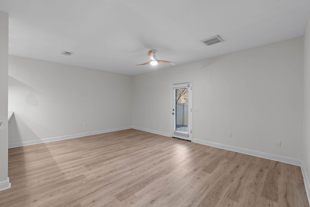 unfurnished room with ceiling fan and light wood-type flooring