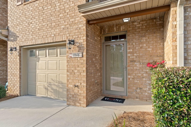 entrance to property with brick siding