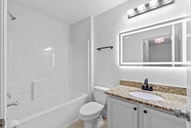 full bathroom with tub / shower combination, vanity, a textured ceiling, tile patterned floors, and toilet