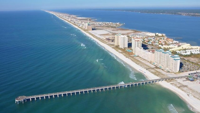 bird's eye view featuring a beach view and a water view