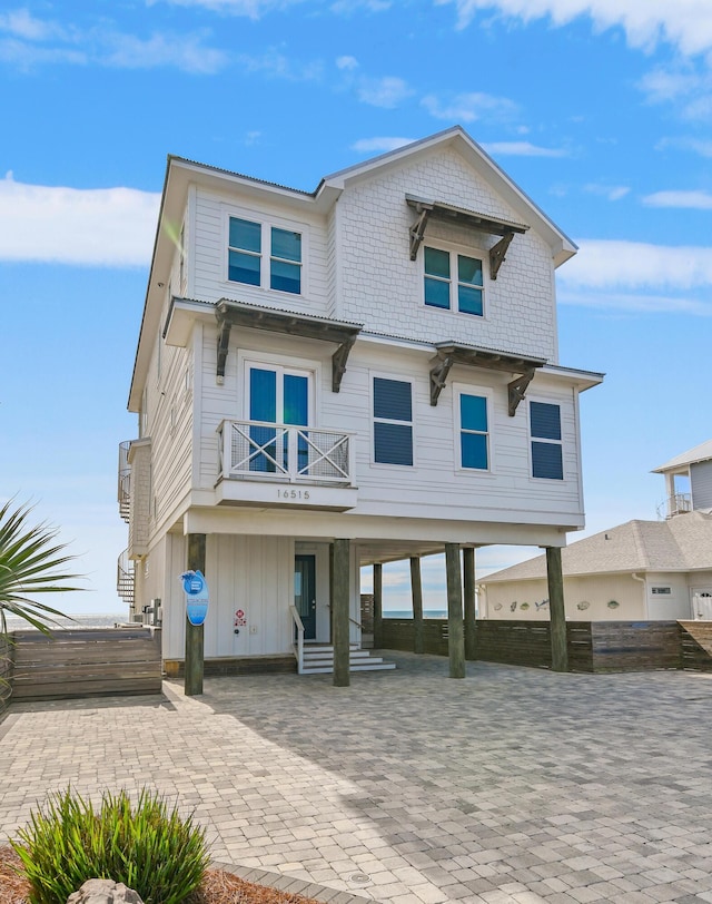 view of front of property with a carport