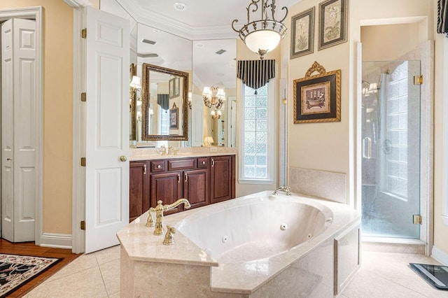 bathroom featuring separate shower and tub, crown molding, tile patterned flooring, and vanity