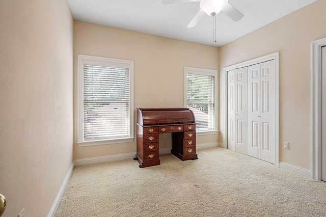 interior space featuring ceiling fan