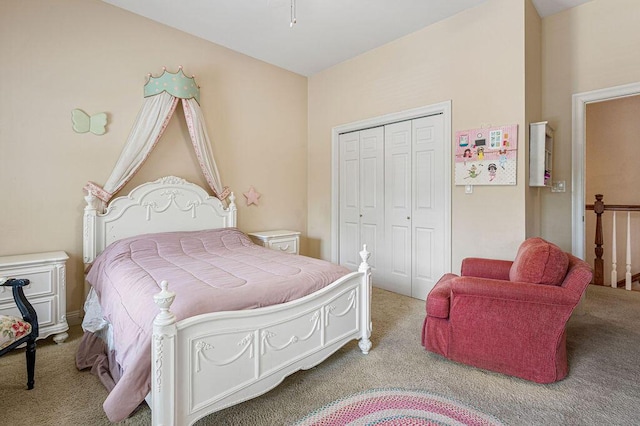 carpeted bedroom with a closet