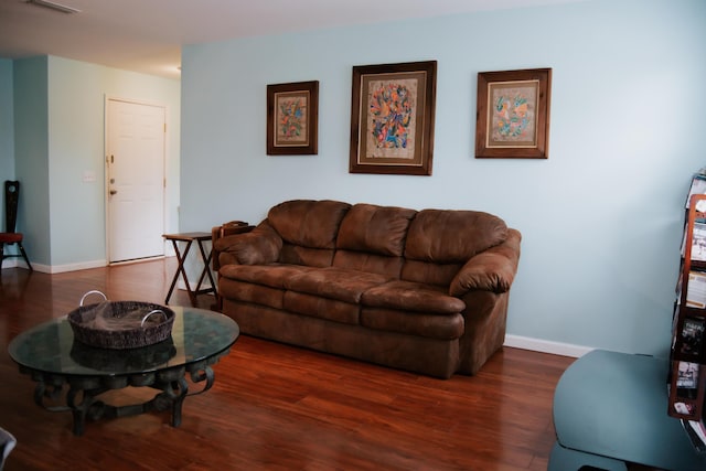 living room featuring dark hardwood / wood-style floors