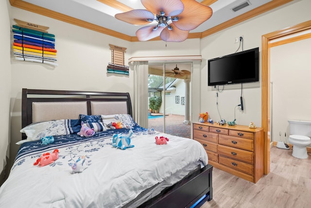 bedroom with ornamental molding, access to outside, and light hardwood / wood-style flooring