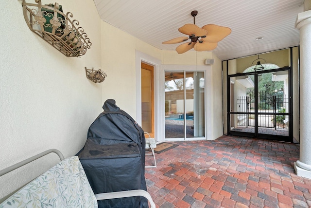 view of patio with ceiling fan