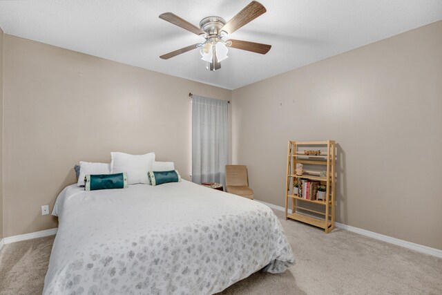 1775 Village Pkwy, Gulf Breeze, FL 32563 - carpeted bedroom with ceiling fan