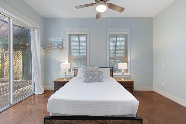 tiled bedroom with access to outside and ceiling fan