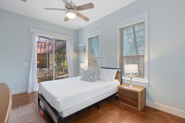 bedroom with access to outside, tile patterned floors, and ceiling fan