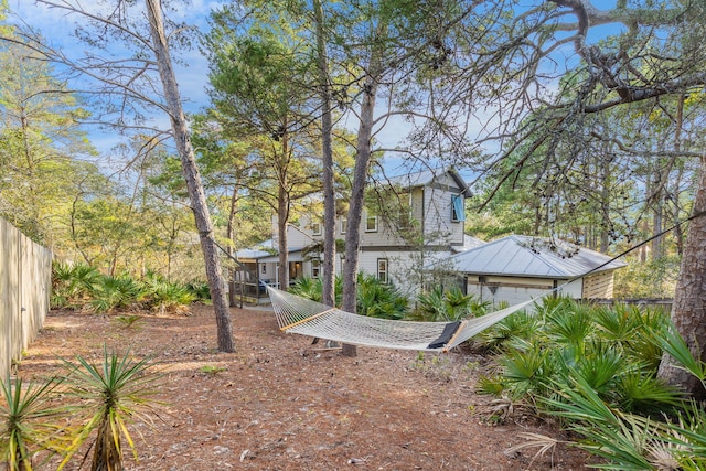 view of yard with a garage