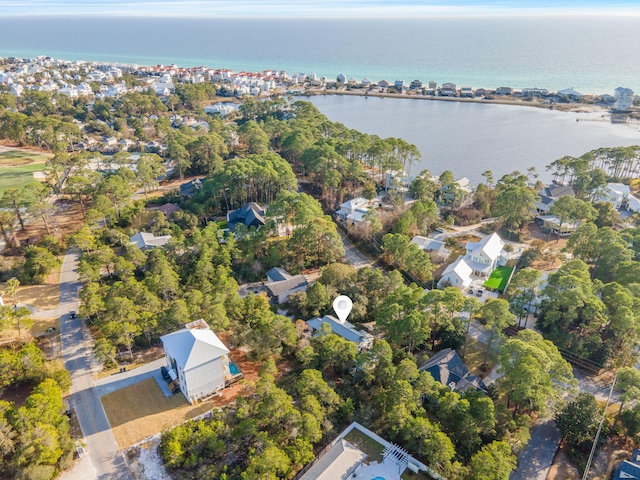 drone / aerial view with a water view