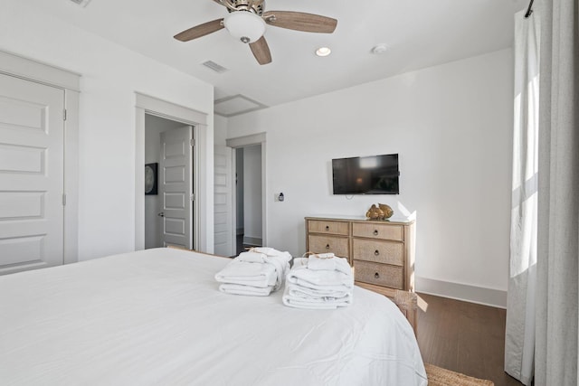 bedroom with dark wood-type flooring and ceiling fan