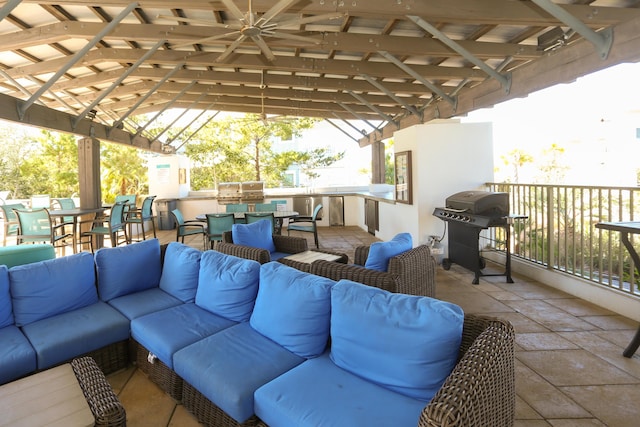 view of patio with a pergola, grilling area, and outdoor lounge area