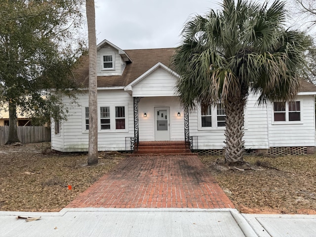 view of front of property with fence