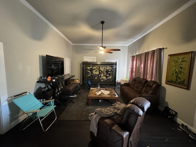 living room with baseboards, a ceiling fan, and crown molding