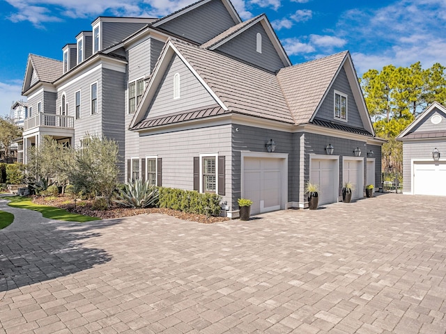 view of side of property featuring a garage