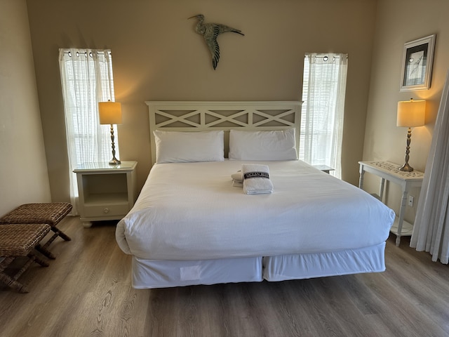 bedroom featuring wood-type flooring