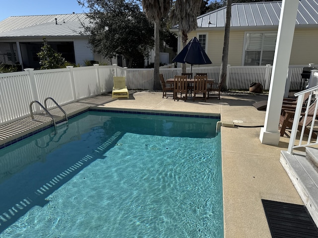 view of pool with a patio area