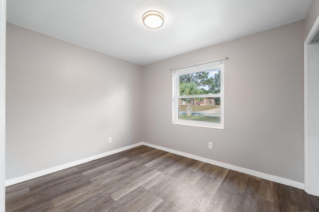 spare room featuring hardwood / wood-style flooring