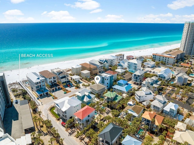 aerial view featuring a water view and a beach view