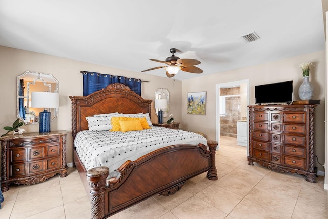 bedroom with light tile patterned floors, ceiling fan, visible vents, and connected bathroom