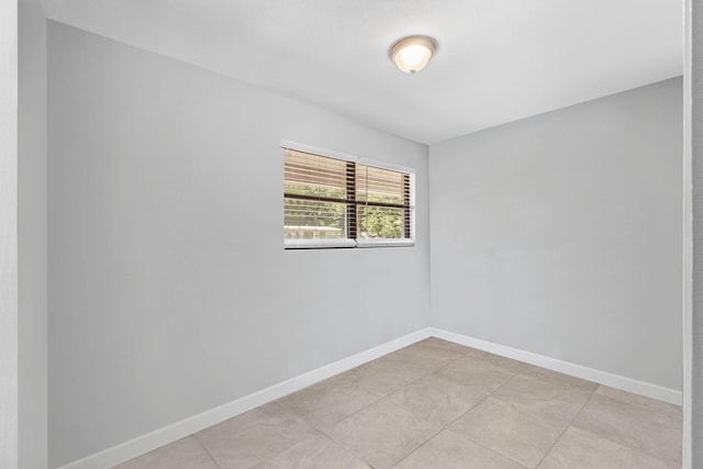 view of tiled spare room